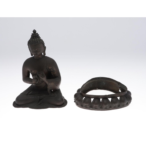 885 - LARGE BRONZE BUDDHA. Possibly Tibetan, the figure seated in meditation and with shou style symbols. ... 