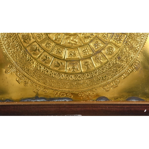 889 - THAILAND - LARGE FRAMED DECORATIVE METAL PLAQUE. A large beaten metal plaque of rectangular shape, w... 