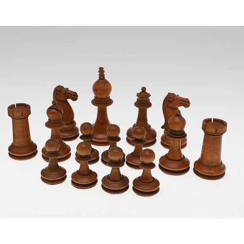 633A - ANTIQUE WOODEN CHESS SET. A boxwood and stained boxwood chess set, probably late 19thc/early 20thc a... 