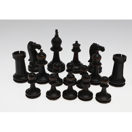 633A - ANTIQUE WOODEN CHESS SET. A boxwood and stained boxwood chess set, probably late 19thc/early 20thc a... 