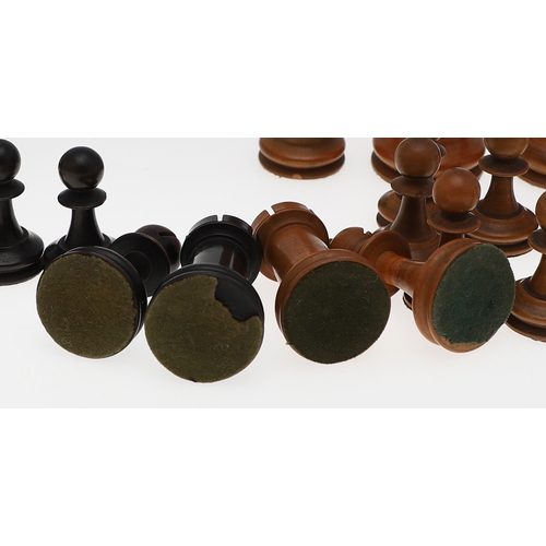 633A - ANTIQUE WOODEN CHESS SET. A boxwood and stained boxwood chess set, probably late 19thc/early 20thc a... 