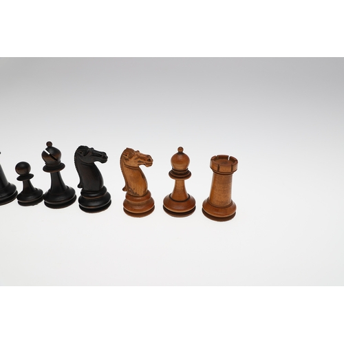 633A - ANTIQUE WOODEN CHESS SET. A boxwood and stained boxwood chess set, probably late 19thc/early 20thc a... 