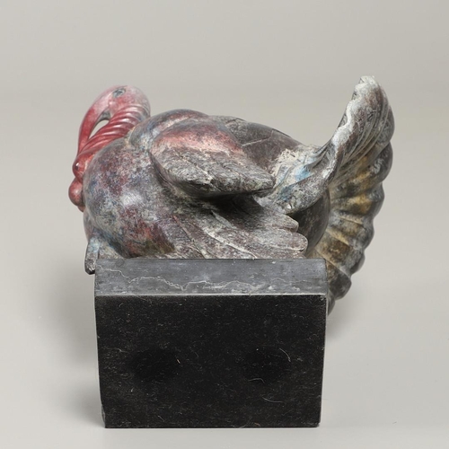 564 - FRANCOIS POMPON (1855-1933). DINDE. (d) Bronze, with variegated patination and a red head and neck, ... 