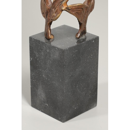 567 - JOHN BEHAN (B.1938). FLIGHT OF THE BIRDS. (d) Signed, light brown patina, on granite base
65cm; plus... 