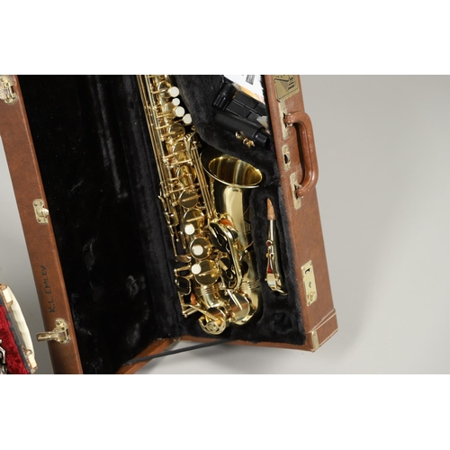 595 - CASED SAXOPHONE - TREVOR JAMES & CO, & ENGLISH CASED CLARINET. A brass 'The Horn' saxophone, Serial ... 