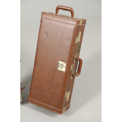 595 - CASED SAXOPHONE - TREVOR JAMES & CO, & ENGLISH CASED CLARINET. A brass 'The Horn' saxophone, Serial ... 