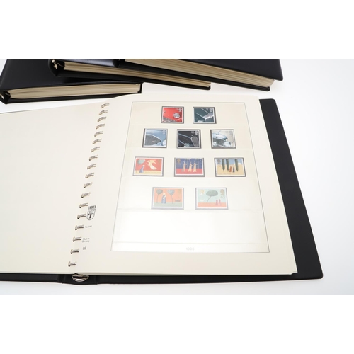 597 - GREAT BRITAIN STAMP ALBUMS. Four albums with mostly mint 20thc stamps, including QE II definitives (... 