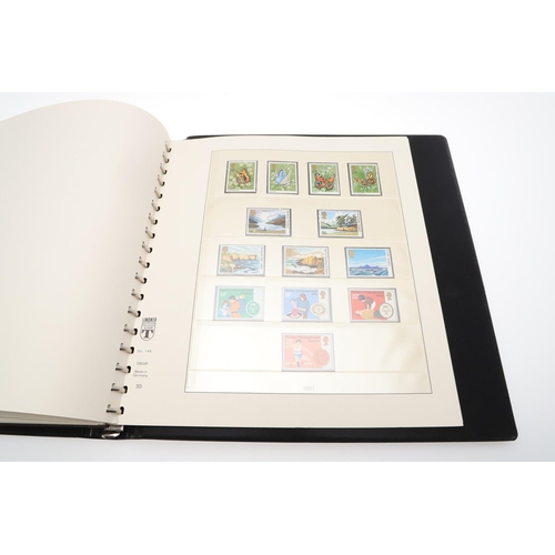 597 - GREAT BRITAIN STAMP ALBUMS. Four albums with mostly mint 20thc stamps, including QE II definitives (... 