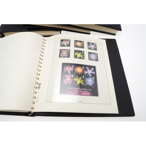 597 - GREAT BRITAIN STAMP ALBUMS. Four albums with mostly mint 20thc stamps, including QE II definitives (... 