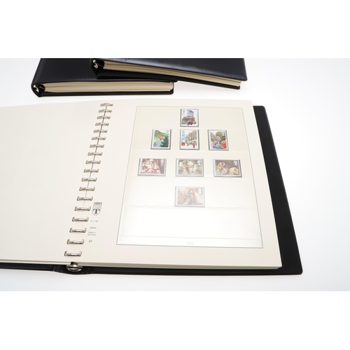 597 - GREAT BRITAIN STAMP ALBUMS. Four albums with mostly mint 20thc stamps, including QE II definitives (... 