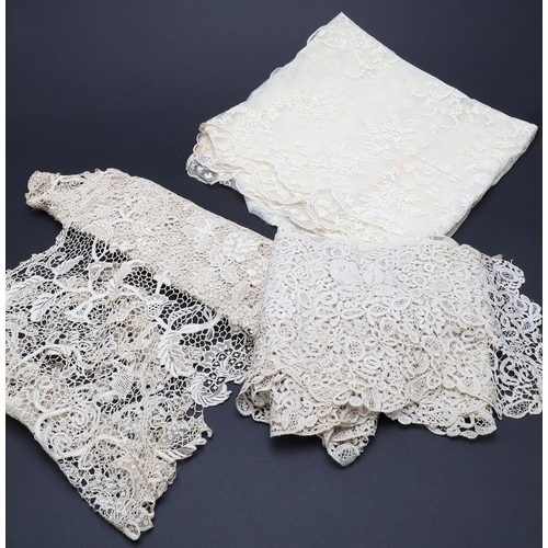 598 - VINTAGE LACE & CLOTHING. A collection of late 19thc and early 20thc lace, including Brussels and Hon... 