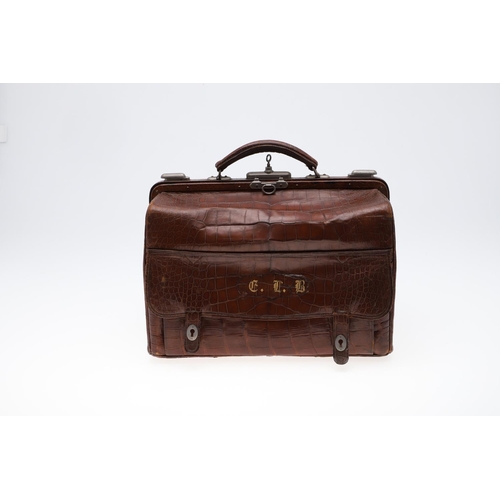 613 - A 19TH CENTURY CROCODILE SKIN GLADSTONE BAG & ANOTHER BAG. A Gladstone crocodile skin bag, with a gr... 