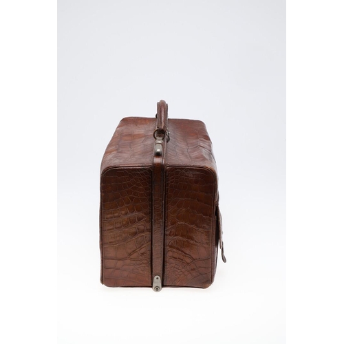 613 - A 19TH CENTURY CROCODILE SKIN GLADSTONE BAG & ANOTHER BAG. A Gladstone crocodile skin bag, with a gr... 