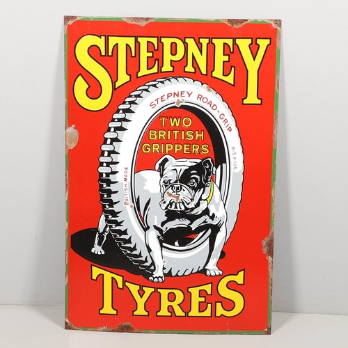 619 - VINTAGE ENAMEL PICTORIAL SIGN - STEPNEY TYRES. A vintage sign with a depiction of a Bulldog astride ... 