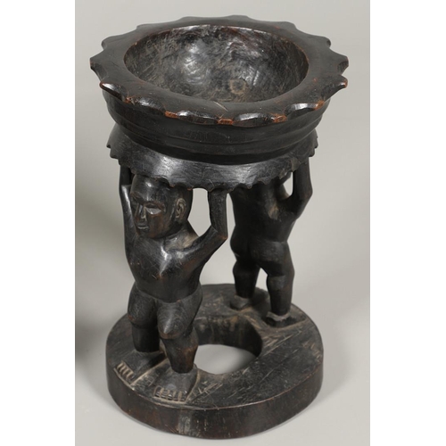 641 - TWO ANTIQUE CARVED TRIBAL STOOLS. Including a large Chief's hardwood stool with dish shaped seat, wi... 