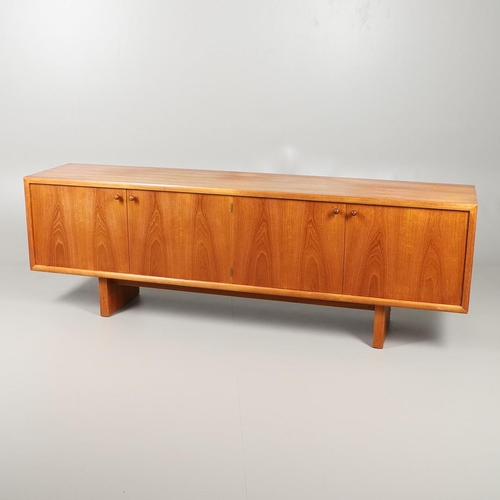 653 - MCINTOSH 'MC' MID CENTURY DINING SUITE 1973. Comprising a large teak sideboard with two large cupboa... 