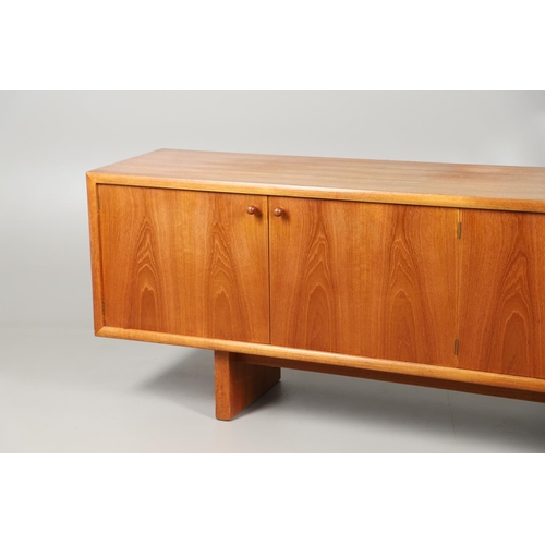 653 - MCINTOSH 'MC' MID CENTURY DINING SUITE 1973. Comprising a large teak sideboard with two large cupboa... 