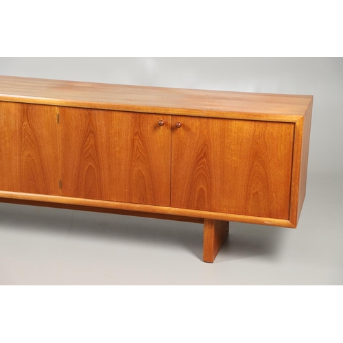 653 - MCINTOSH 'MC' MID CENTURY DINING SUITE 1973. Comprising a large teak sideboard with two large cupboa... 