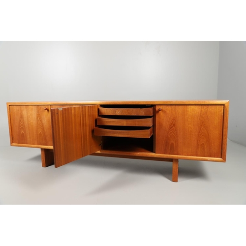 653 - MCINTOSH 'MC' MID CENTURY DINING SUITE 1973. Comprising a large teak sideboard with two large cupboa... 