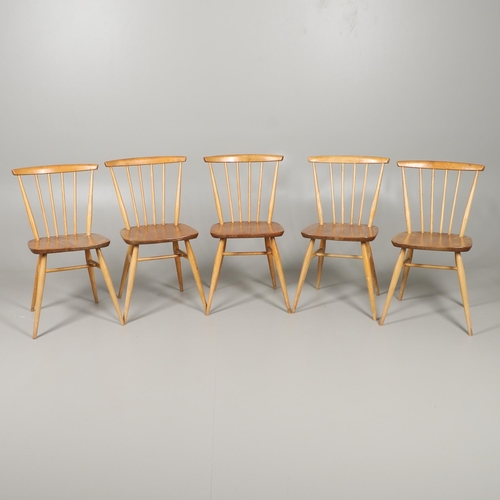 660 - SET OF ERCOL VINTAGE STICK BACK CHAIRS. A set of five Ercol light elm and beech stick back chairs, e... 