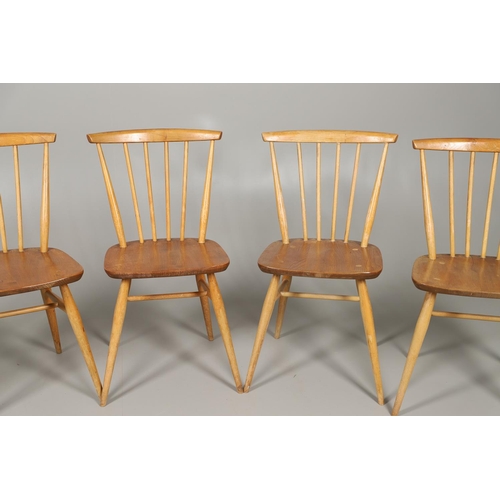 660 - SET OF ERCOL VINTAGE STICK BACK CHAIRS. A set of five Ercol light elm and beech stick back chairs, e... 