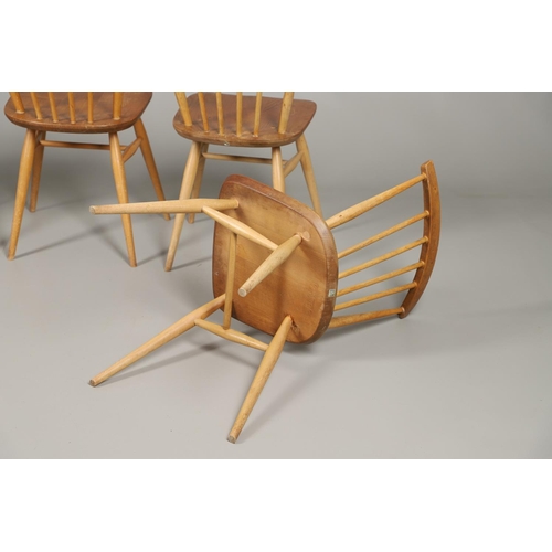 660 - SET OF ERCOL VINTAGE STICK BACK CHAIRS. A set of five Ercol light elm and beech stick back chairs, e... 