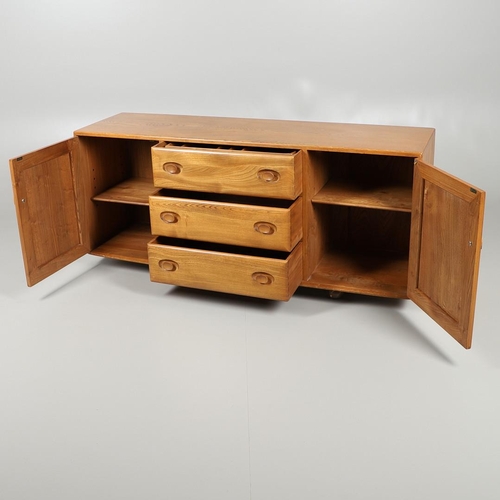 661 - LARGE ERCOL VINTAGE SIDEBOARD. A large elm sideboard with three central drawers including cutlery tr... 