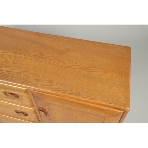 661 - LARGE ERCOL VINTAGE SIDEBOARD. A large elm sideboard with three central drawers including cutlery tr... 