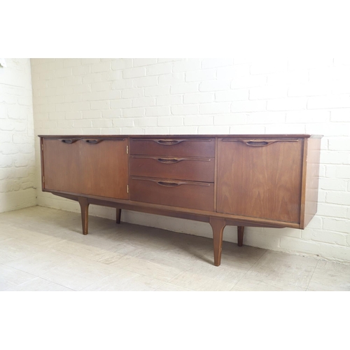 662 - G PLAN - RETRO TEAK SIDEBOARD. A teak sideboard with a large two door cupboard, three drawers (one f... 