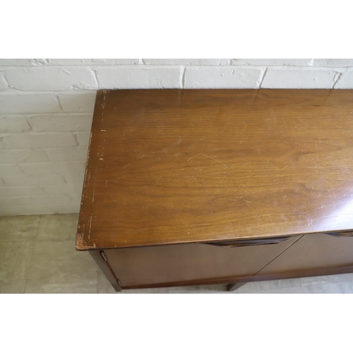 662 - G PLAN - RETRO TEAK SIDEBOARD. A teak sideboard with a large two door cupboard, three drawers (one f... 