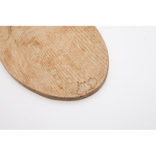 665 - ROBERT THOMPSON OF KILBURN CHEESE BOARD & TWO SMALL DISHES. An oval cheese board with curved handle ... 