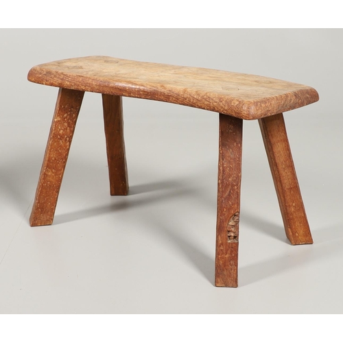 667 - THOMAS WHITTAKER 'GNOMEMAN' STOOL & ALAN GRAINGER 'ACORN MAN' STOOL. A Gnomeman oak stool with a cur... 