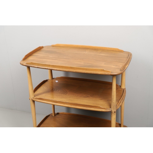 668 - ERCOL TEA TROLLEY & PLATE RACK. A three tier light elm and beech tea trolley, raised on roller casto... 