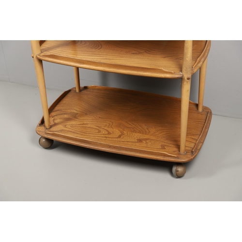 668 - ERCOL TEA TROLLEY & PLATE RACK. A three tier light elm and beech tea trolley, raised on roller casto... 