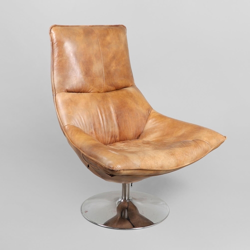 671 - ANDREW MARTIN - DESIGNER LEATHER SWIVEL CHAIR 'CARLOTTA'. A leather swivel chair of large proportion... 