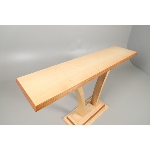 672 - MARCUS WHITE OF DORSET - CONTEMPORARY CONSOLE TABLE. The rectangular shaped top made in fiddle back ... 