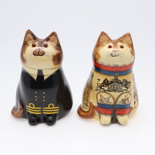 689 - JOAN & DAVID BETHEL - RYE POTTERY CATS, MILITARY & NAVY. A Cat from 1996, Model No 5071, decorated w... 