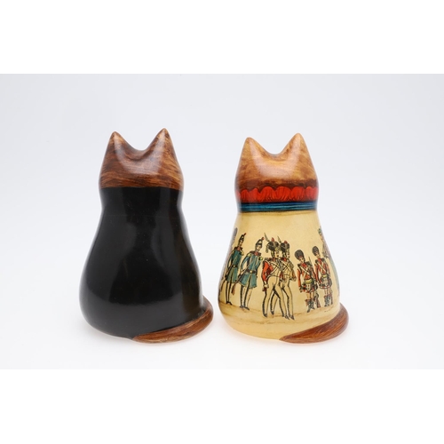 689 - JOAN & DAVID BETHEL - RYE POTTERY CATS, MILITARY & NAVY. A Cat from 1996, Model No 5071, decorated w... 