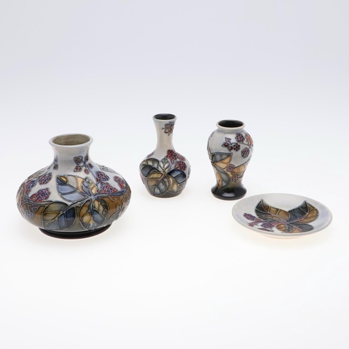 722 - MODERN MOORCROFT ITEMS - BRAMBLE DESIGN. Four items in the Bramble design, including a squat vase (1... 