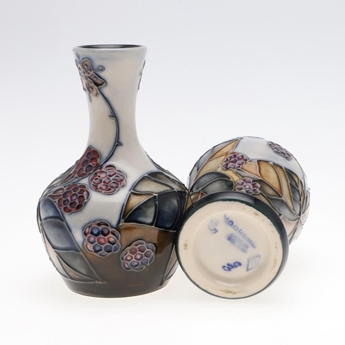 722 - MODERN MOORCROFT ITEMS - BRAMBLE DESIGN. Four items in the Bramble design, including a squat vase (1... 