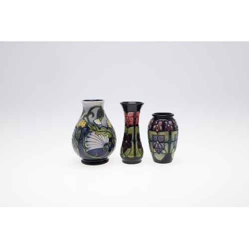 723 - COLLECTION OF MODERN MOORCROFT POTTERY. Including five various items in the 'Violet' design (vases 2... 