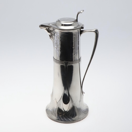 730 - ORIVIT - LARGE GERMAN ART NOUVEAU PEWTER FLAGON OR EWER. A large ewer or flagon, the spout in the fo... 