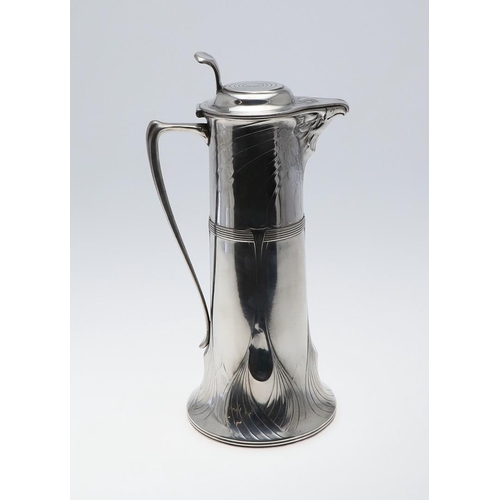 730 - ORIVIT - LARGE GERMAN ART NOUVEAU PEWTER FLAGON OR EWER. A large ewer or flagon, the spout in the fo... 