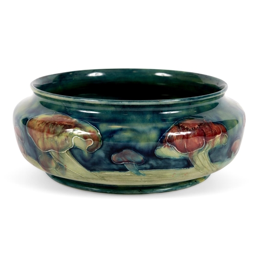 732 - A MOORCROFT CLAREMONT BOWL - LIBERTY & CO. A Moorcroft bowl of shallow form, painted in the Claremon... 