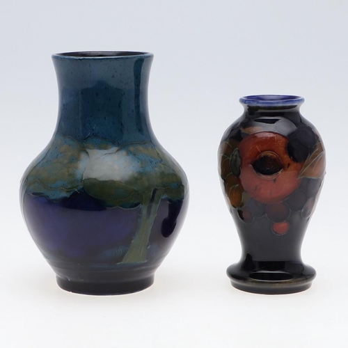 733 - MOORCROFT MOONLIT BLUE VASE & MINIATURE POMEGRANATE VASE. A Moorcroft vase of squat form in the Moon... 