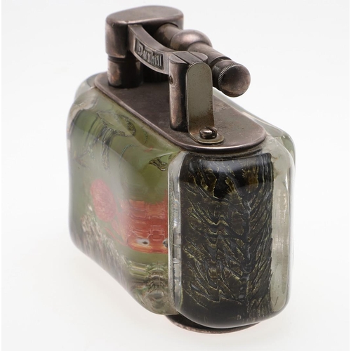 740 - DUNHILL AQUARIUM TABLE LIGHTER. A table lighter with lucite panels and silver plated mounts, carved ... 