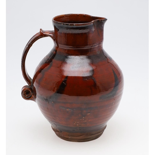 743 - EARLY ST IVES STUDIO POTTERY JUG - SLIPWARE. Possibly by Michael Cardew and circa 1920's/30's, the s... 