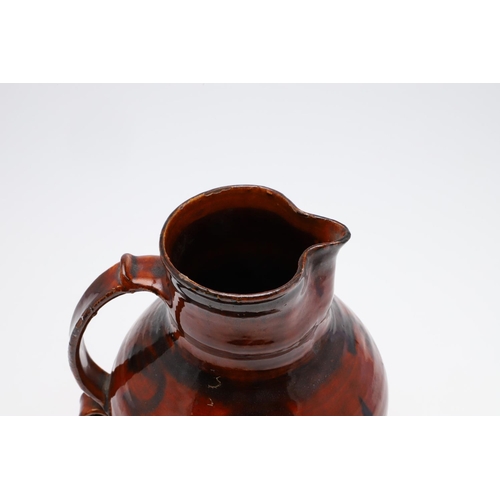 743 - EARLY ST IVES STUDIO POTTERY JUG - SLIPWARE. Possibly by Michael Cardew and circa 1920's/30's, the s... 