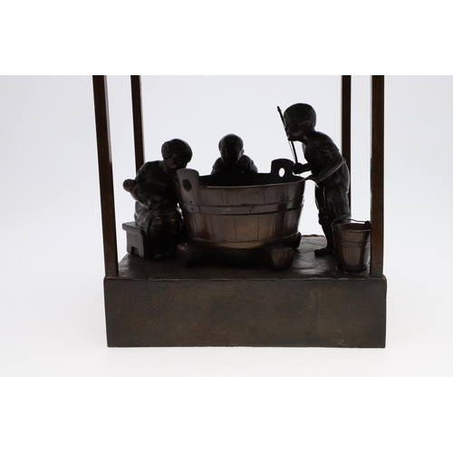 746 - OSWALD SCHIMMELPFENNIG - GERMAN BRONZE FIGURAL TABLE LAMP. In the form of three children fishing fro... 