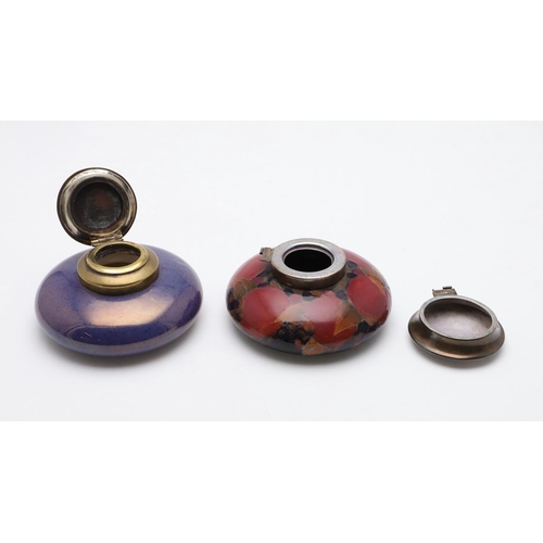 747 - ANTIQUE MOORCROFT INKWELLS. Including an unusual inkwell with a purple lustre glaze and pink undersi... 